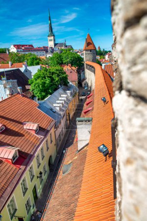 Photo for Tallinn, Estonia - July 15, 2017: Tallinn streets and medieval walls on a sunny summer day. - Royalty Free Image