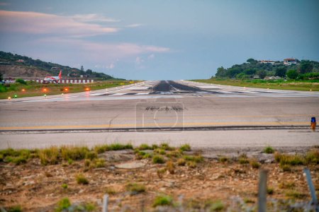 Photo for Skiathos airport runway at sunset. - Royalty Free Image