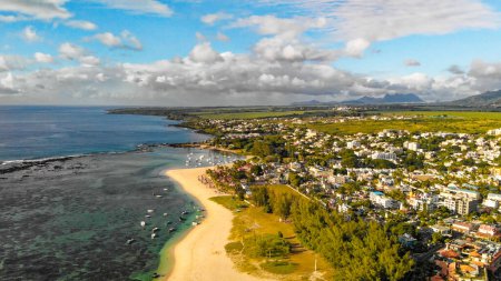 Téléchargez les photos : Amazing aerial view of Flic en Flac Beach at sunset, Mauritius Island. - en image libre de droit