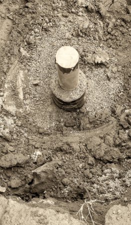 Photo for Preparation for digging a well outside the house. Tools for outdoor construction. - Royalty Free Image