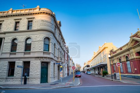 Photo for Fremantle, Australia - September 10, 2023: City streets and buildings at sunset. - Royalty Free Image
