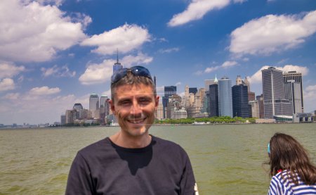 Photo for Happy man with New York skyline on the background. - Royalty Free Image