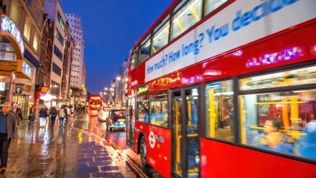 Photo for London - September 2012: Double Decker Red Bus along the city streets. - Royalty Free Image