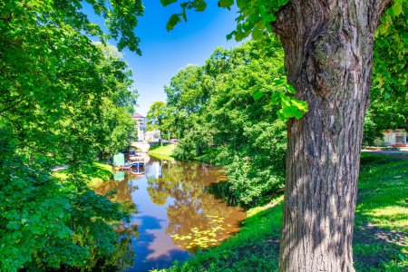 Photo for Riga, Latvia - July 7, 2017: City park and river. - Royalty Free Image