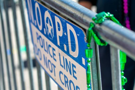 Photo for New Orleans Police Department - Police Line Do Not Cross sign for Mardi Gras event. - Royalty Free Image