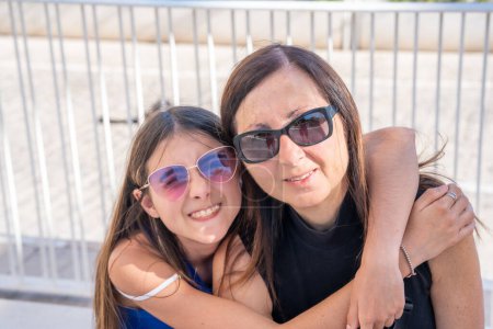 Photo for Mother and daughter enjoying outdoor time together. - Royalty Free Image