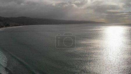 Photo for Ocean at sunset, view from drone. - Royalty Free Image