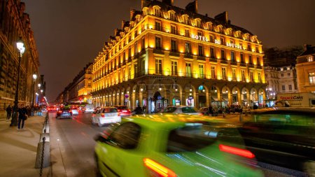 Photo for Paris - December 2012: City streets at night in winter. - Royalty Free Image