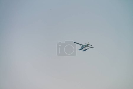 Photo for Small airplane in the sky. - Royalty Free Image