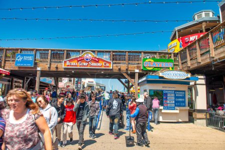 Photo for San Francisco, CA - August 7, 2017: Tourists enjoy city life at Pier 39. - Royalty Free Image