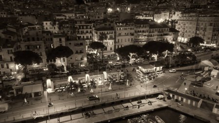 Photo for Aerial view of Sanremo at night, Italy. Port and city buildings. - Royalty Free Image