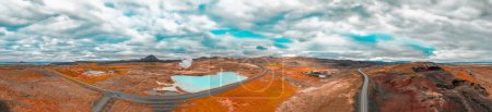 Photo for Aerial view of Blue lake made from water coming out of geothermal power plant from above, Iceland. - Royalty Free Image