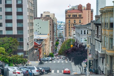 Photo for San Francisco, CA - August 5, 2017: City streets and buildings on a foggy day. - Royalty Free Image