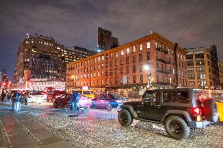 Photo for New York City - December 1, 2018: Streets of Meatpacking District at night. - Royalty Free Image