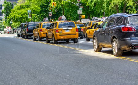 Photo for New York City - June 2013: City streets in summer season. - Royalty Free Image