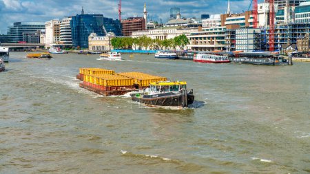 Photo for London - September 2012: The Thames River on a summer day. - Royalty Free Image