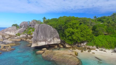 Felicite Island, close to La Digue, Seychelles. Aerial view of tropical coastline on a sunny day.
