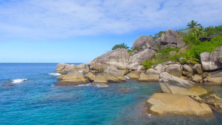 Felicite Island, close to La Digue, Seychelles. Aerial view of tropical coastline on a sunny day.