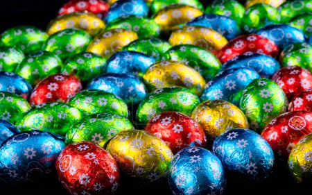 Photo for Small Easter Eggs against a black background. - Royalty Free Image