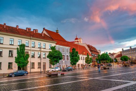 Photo for Vilnius, Lithuania - July 9, 2017: Old buildings in Vilnius city center at summer sunset. - Royalty Free Image
