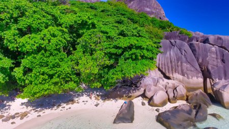 Photo for Anse Source D'Argent Beach in La Digue, Seychelles. Aerial view of tropical coastline on a sunny day. - Royalty Free Image