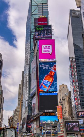 Photo for New York City - June 2013: TImes Square is a famous tourist attraction. - Royalty Free Image
