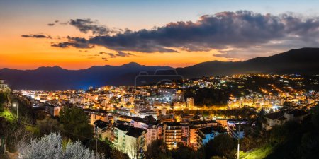 Aerial view of Sanremo town and hills at sunset, Liguria - Italy.