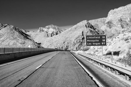 Téléchargez les photos : Road across Nevada landscape in summer season. - en image libre de droit