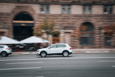Photo for Ukraine, Kyiv - 2 August 2021: White Volkswagen Tiguan car moving on the street. Editorial - Royalty Free Image