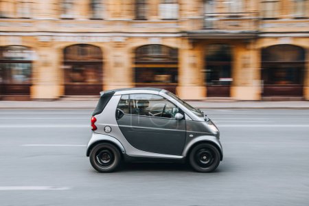 Photo for Ukraine, Kyiv - 2 August 2021: Black smart Fortwo car moving on the street. Editorial - Royalty Free Image