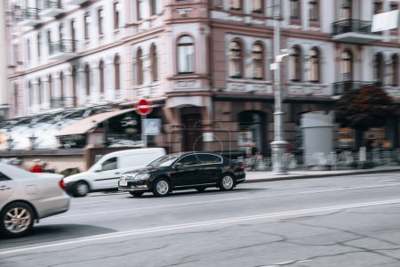 Photo for Ukraine, Kyiv - 2 August 2021: Black Volkswagen Passat car moving on the street. Editorial - Royalty Free Image