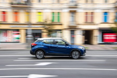 Photo for Ukraine, Kyiv - 2 August 2021: Blue Nissan Kicks car moving on the street. Editorial - Royalty Free Image