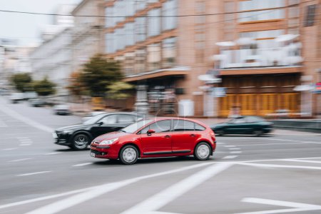 Photo for Ukraine, Kyiv - 2 August 2021: Red Citroen C4 car moving on the street. Editorial - Royalty Free Image