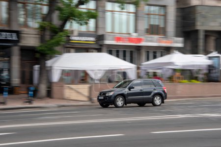 Photo for Ukraine, Kyiv - 2 August 2021: Gray Suzuki Grand Vitara car moving on the street. Editorial - Royalty Free Image