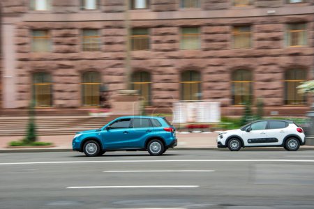 Photo for Ukraine, Kyiv - 2 August 2021: Blue Suzuki Vitara car moving on the street. Editorial - Royalty Free Image