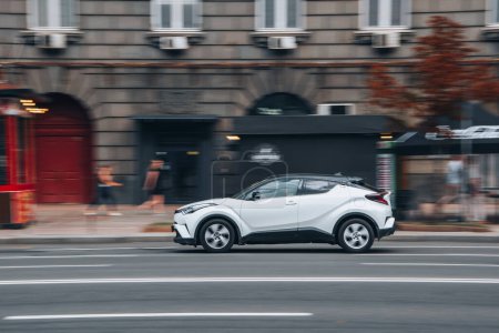 Photo for Ukraine, Kyiv - 2 August 2021: White Toyota C-HR car moving on the street. Editorial - Royalty Free Image