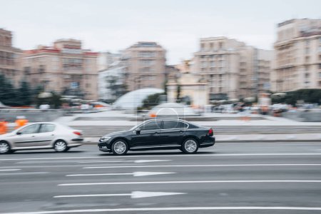 Photo for Ukraine, Kyiv - 2 August 2021: Black Volkswagen Passat car moving on the street. Editorial - Royalty Free Image