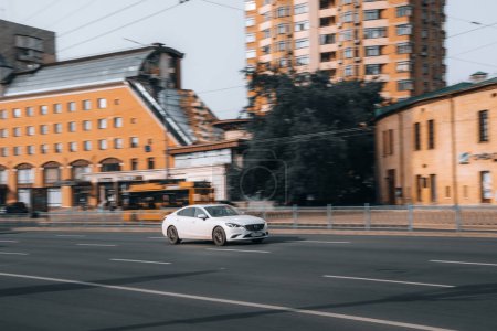 Photo for Ukraine, Kyiv - 16 Jule 2021: White MAZDA 6 car moving on the street. Editorial - Royalty Free Image