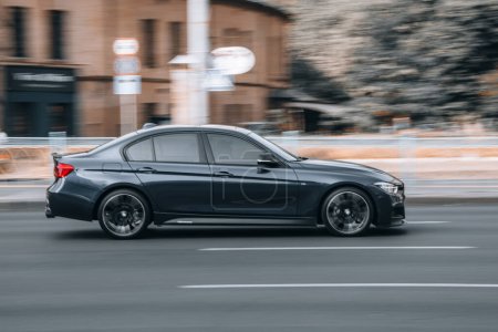 Photo for Ukraine, Kyiv - 16 Jule 2021: Gray BMW M3 car moving on the street. Editorial - Royalty Free Image