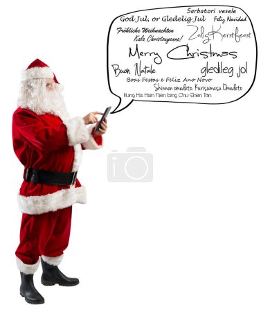 Foto de Santa Claus envía mensajes de saludo por teléfono móvil - Imagen libre de derechos
