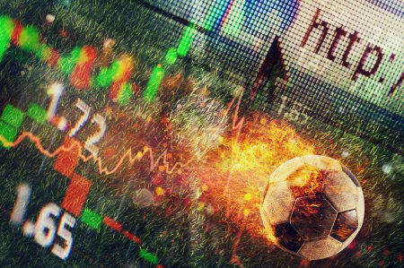 Foto de Bola de fútbol ardiente y concepto de apuesta con análisis y estadísticas - Imagen libre de derechos