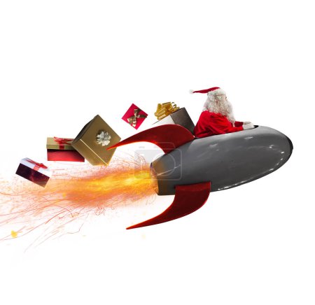 Téléchargez les photos : Santa Claude livre des cadeaux avec une fusée rapide - en image libre de droit