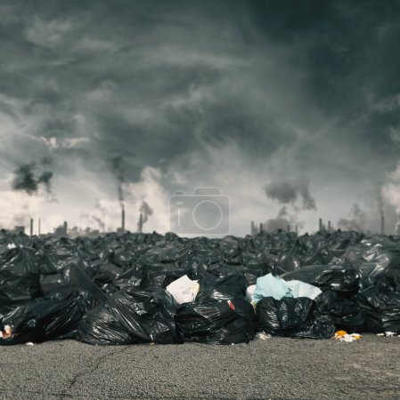 Foto de Environment damaged by garbage and pollution. ecology concept - Imagen libre de derechos