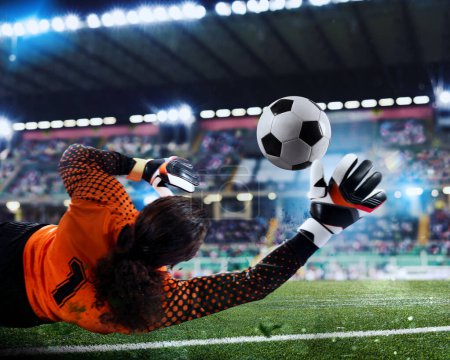 Photo for Football close up scene at the stadium of a goalkeeper that catches the ball - Royalty Free Image