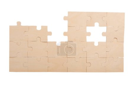 Foto de Puzzle de pared con la pieza que falta. concepto trabajo en equipo e integración - Imagen libre de derechos