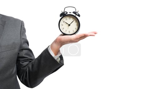 businessman hold a alarm clock to set the deadline