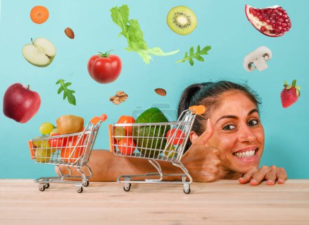 Photo for Happy woman made an healthy shopping of fresh fruit - Royalty Free Image