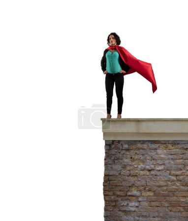 Photo for Super business woman over a wall ready to fly - Royalty Free Image