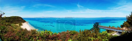 Photo for Panorama of the beach and pedestrian bridge to the sea, Halkidiki, Greece - Royalty Free Image