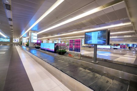 Photo for SINGAPORE - CIRCA JANUARY, 2020: baggage claim area at Singapore Changi Airport. Changi Airport is a major civilian airport that serves Singapore. - Royalty Free Image